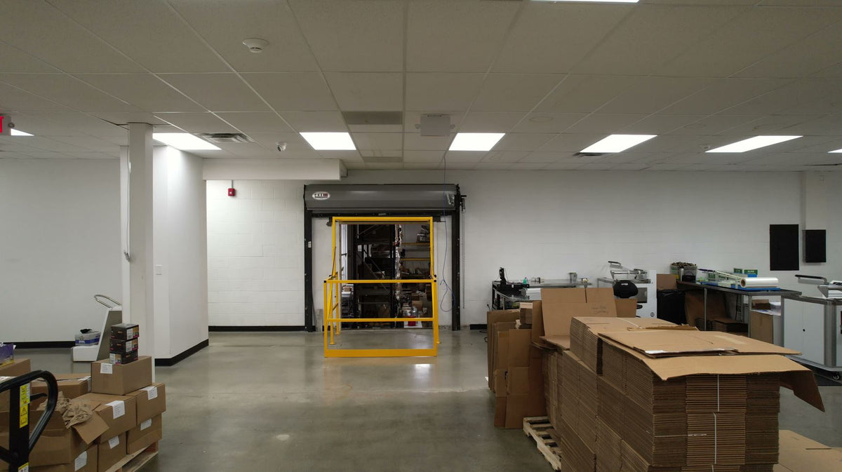 a yellow metal frame in a warehouse
