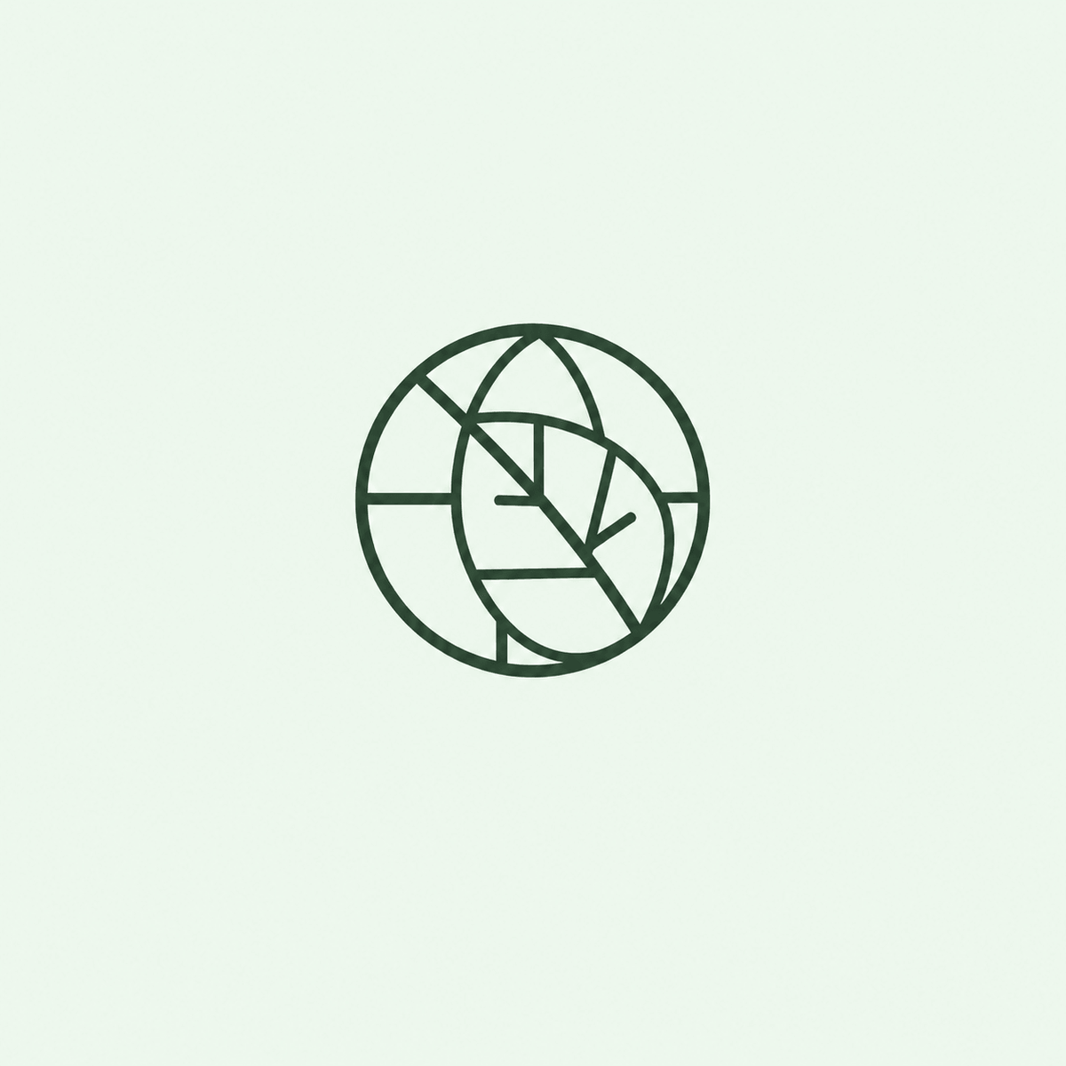 a logo of a leaf in a circle