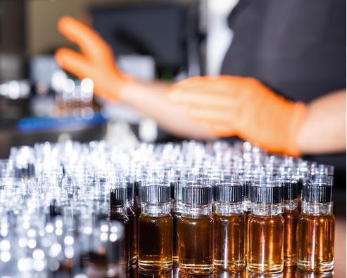 a group of small bottles with brown liquid in them