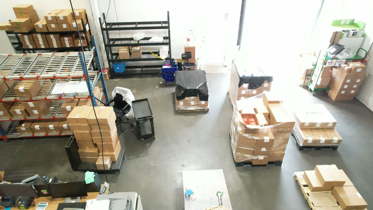 a room with boxes and shelves
