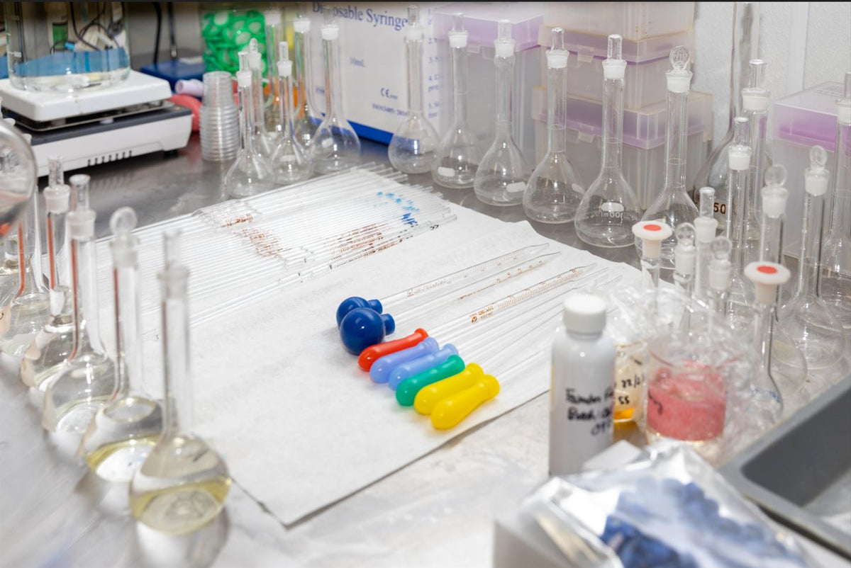 a group of test tubes and beakers